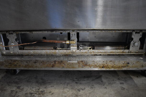 Garland SunFire Stainless Steel Commercial Natural Gas Powered 6 Burner Range w/ Oven and Back Splash on Commercial Casters. 36x34x45 - Image 7 of 7