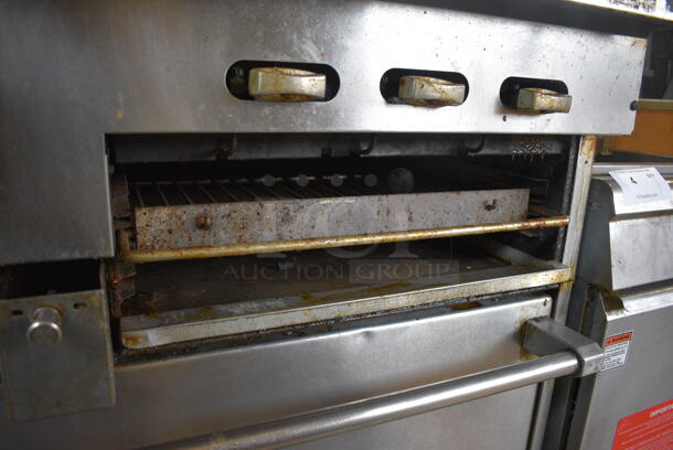 Garland SunFire Stainless Steel Commercial Natural Gas Powered 6 Burner Range w/ Flat Top Griddle, 2 Ovens, Over Shelf and Back Splash on Commercial Casters. 60x33x60 - Image 11 of 11