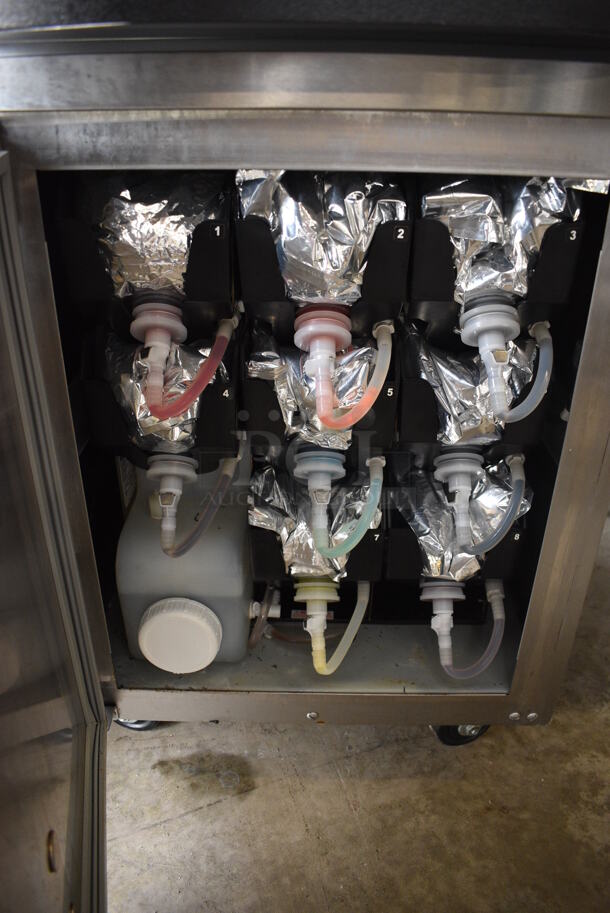 2017 Taylor Model C709-27 Stainless Steel Commercial Air Cooled Single Flavor Soft Serve Ice Cream Machine w/ Taylor Model C20100-WFB 10 Head Flavor Blast and Color Touch Panel for Flavor Burst on Commercial Casters. 208-230 Volts, 1 Phase. 23x33x61 - Image 6 of 10