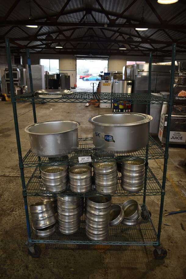 ALL ONE MONEY! Lot of Items on Shelving Unit Including Metal Round Baking Pans. Does Not Include Shelving Unit. - Image 1 of 7