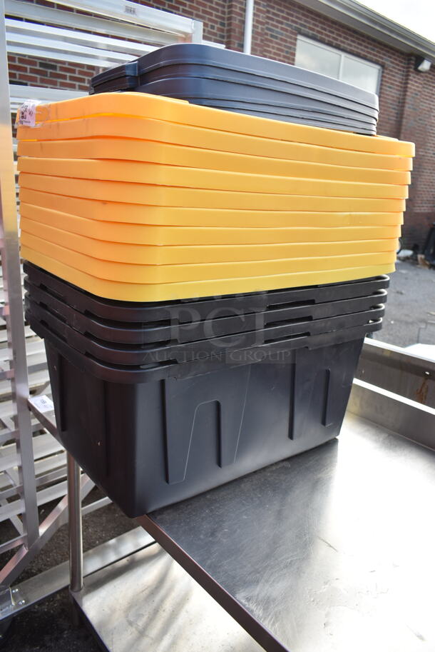 ALLL ONE MONEY! Lot of 4 Black Poly Bins, 10 Yellow Poly Lids and 5 Gray Poly Lids. Includes 28x18x13.5 - Image 1 of 5