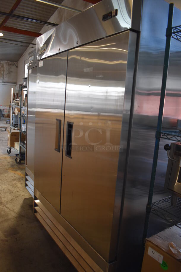 EXCELLENT CONDITION! Avantco 178A49RHC Stainless Steel Commercial 2 Door Reach In Cooler w/ Poly Coated Racks on Commercial Casters. 115 Volts, 1 Phase. 54x33x82.5. Tested and Working! - Image 4 of 8