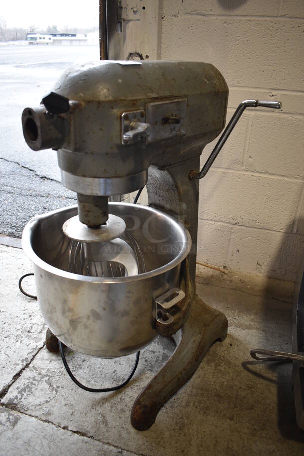 Hobart Model A200 Metal Commercial Countertop 20 Quart Planetary Mixer w/ Stainless Steel Mixing Bowl, Dough Hook and Whisk Attachment. 110 Volts, 1 Phase. 15x20x30. Tested and Powers On But Parts Do Not Move