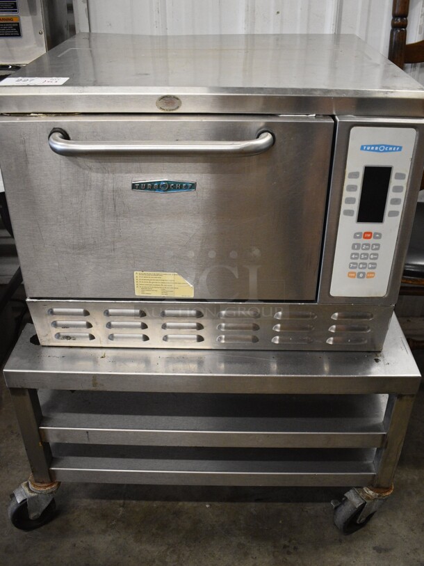 Turbochef NGC Stainless Steel Commercial Countertop Electric Powered Rapid Cook Oven w/ Stainless Steel Equipment Stand on Commercial Casters. 208/240 Volts, 1 Phase. 26x24x19, 30x30x17