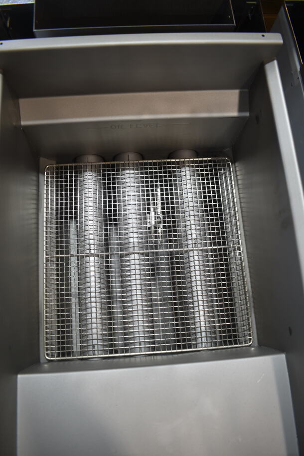 BRAND NEW SCRATCH AND DENT! Imperial IFS-40 Stainless Steel Commercial Floor Style Natural Gas Powered Deep Fat Fryer w/ 2 Metal Fry Baskets. Does Not Have Back Panel. 105,000 BTU.  - Image 6 of 8