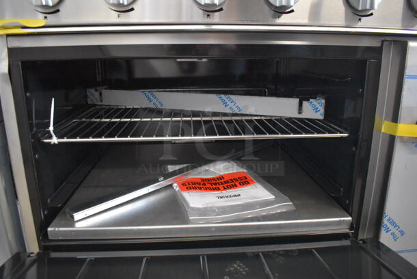 BRAND NEW SCRATCH AND DENT! Imperial Range Pro Series IR-6-E Stainless Steel Commercial Electric Powered 6 Round Plate Range w/ Oven, Over Shelf and Back Splash. 240 Volts, 3 Phase. - Image 5 of 10