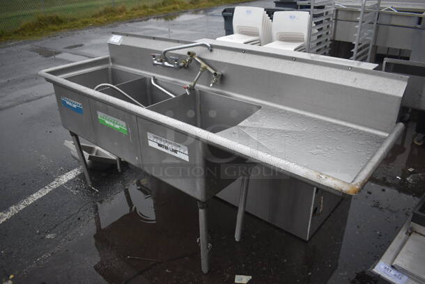 Stainless Steel Commercial 3 Bay Sink w/ Right Side Drain Board, Faucet, Handles and Spray Nozzle Attachment. 82x25x44. Bays 18x18x12. Drain Board 24x20x1