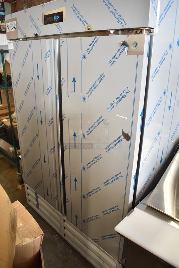 BRAND NEW SCRATCH AND DENT! 2023 Avantco 447AP49F Stainless Steel Commercial 55 3/8" Stainless Steel Solid Door Reach-In Freezer w/ Poly Coated Racks. 115 Volts, 1 Phase. Tested and Working! - Image 2 of 7