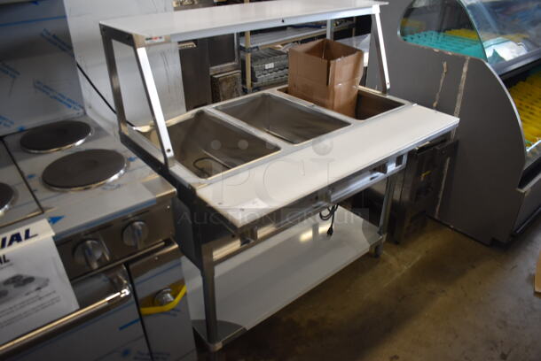 	BRAND NEW SCRATCH AND DENT! ServIt 423EST3WO Stainless Steel Commercial Electric Powered Three Pan Open Well Steam Table with Angled Sneeze Guard and Casters. 120 Volts, 1 Phase. - Image 2 of 10