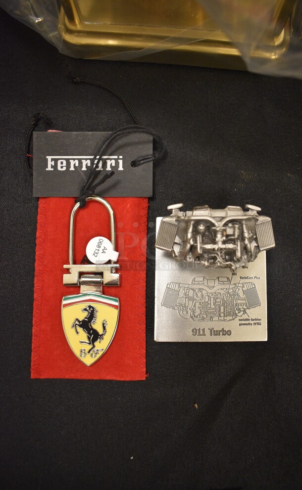 ALL ONE MONEY! Lot of 2 Metal Items; Ferrari Keychain and 911 Turbo Motor Figurine. Includes 2x3x2
