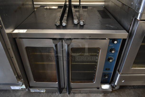 Stainless Steel Commercial Full Size Convection Oven w/ View Through Doors, Metal Oven Racks and Thermostatic Controls. Comes w/ Legs!
