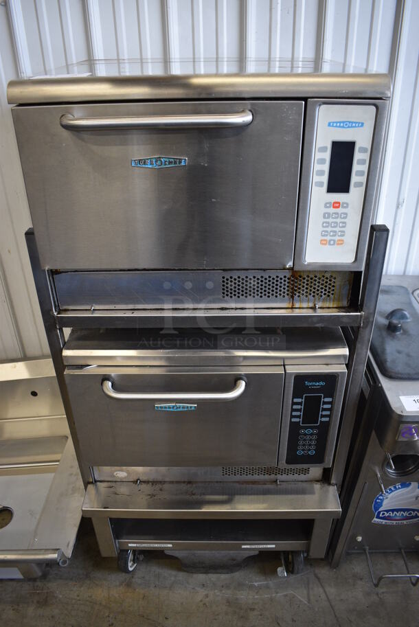 2 Turbochef Model NGCD6 Tornado Stainless Steel Commercial Countertop Electric Powered Rapid Cook Ovens on Stainless Steel Commercial 2 Tier Equipment Stand on Commercial Casters. 208/240 Volts, 1 Phase. 30x30x60. 2 Times Your Bid!