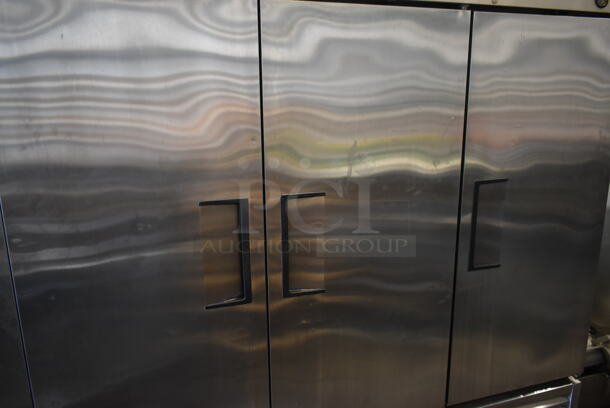 2015 True T-72F ENERGY STAR Stainless Steel Commercial 3 Door Reach In Freezer w/ Poly Coated Racks on Commercial Casters. 115 Volts, 1 Phase. Tested and Working! - Image 3 of 9