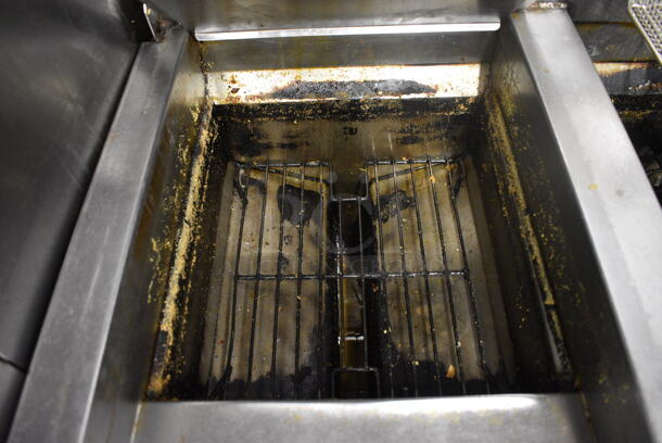 2010 Frymaster Model BIGLA330CSD Stainless Steel Commercial Floor Style Natural Gas Powered 3 Bay Deep Fat Fryer w/ 6 NEW Metal Fry Baskets and 2 Lids on Commercial Casters. 75,000 BTU. 48x33x48.5 - Image 6 of 11