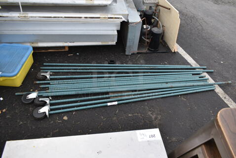 ALL ONE MONEY! Lot of 16 Green Finish Poles for Shelving Unit. 4 Have Casters.