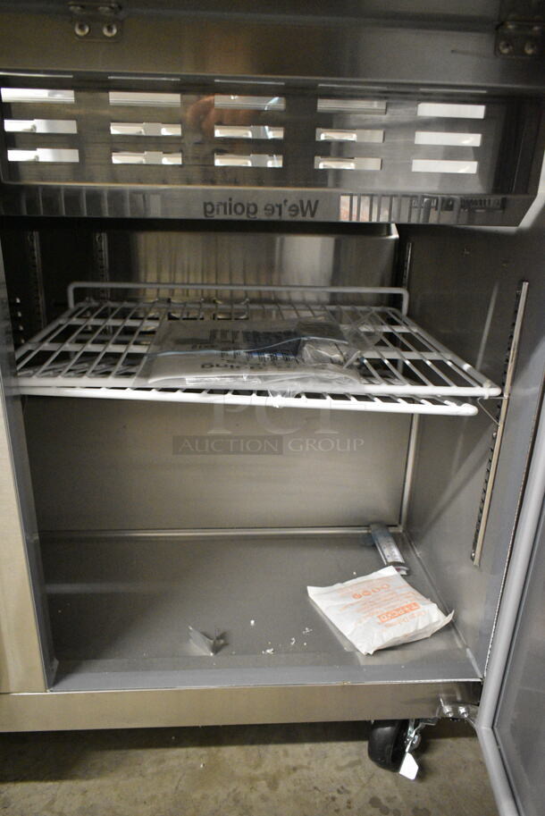 BRAND NEW SCRATCH AND DENT! 2023 Avantco 178SSPT48MHC Stainless Steel 48" 2 Door Mega Top Stainless Steel Refrigerated Sandwich Prep Table on Commercial Casters. 115 Volts, 1 Phase.  Tested and Working! - Image 5 of 8