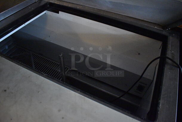 2011 True TSSU-72-30M-B-ST Stainless Steel Commercial Pizza Prep Table on Commercial Casters. BUYER MUST REMOVE. 115 Volts, 1 Phase. 72x34x38. Item Was in Working Condition on Last Day of Business. (Susquehanna Ale House) - Image 4 of 9