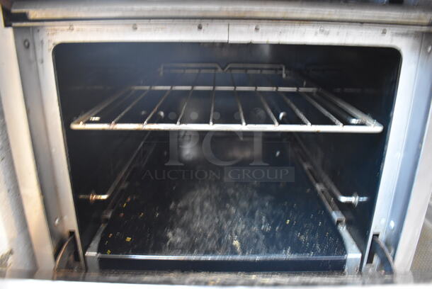 Stainless Steel Commercial Natural Gas Powered 4 Burner Range w/ Oven and Back Splash on Commercial Casters. 24x34x47 - Image 5 of 7