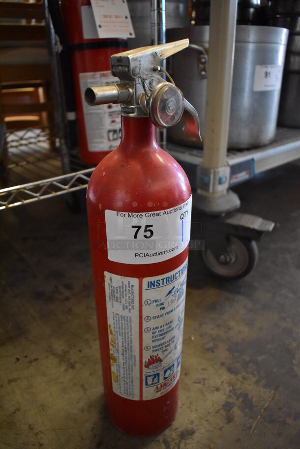 Amgard Fire Extinguisher. 4.5x4.5x18. Buyer Must Pick Up - We Will Not Ship This Item. 