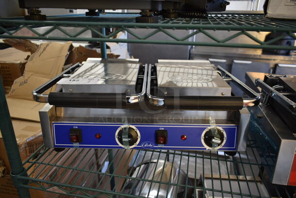BRAND NEW SCRATCH AND DENT! 2022 Globe GPGDUE10 Stainless Steel Commercial Countertop Double Panini Press. 240 Volts.  - Image 1 of 5
