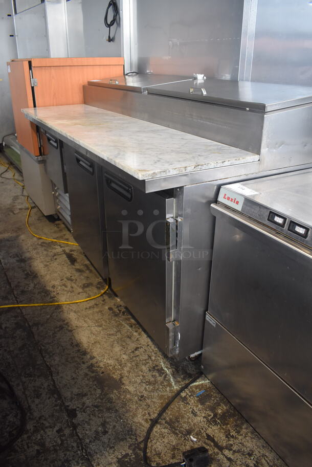 2014 Model Leader ESPT72SC Commercial Stainless Steel Electric Powered Pizza Prep Table With Enclosed Top For Plastic Ingredient Pans, Marble Style Prep Counter With Polycoated Racks on Commercial Casters. 115V Tested And Powers On But Does Not Get Cold - Image 3 of 9