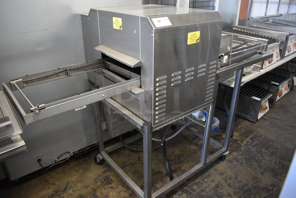 Belshaw Adamatic Model TG50 Stainless Steel Commercial Floor Style Thermoglaze Icing Machine on Commercial Casters. 208 Volts, 1 Phase. 80x33.5x54.5.