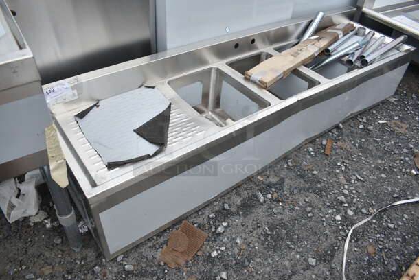BRAND NEW SCRATCH AND DENT! Regency 600B31014219 3 Bowl Underbar Sink with Two Large Drainboards  - Image 3 of 10
