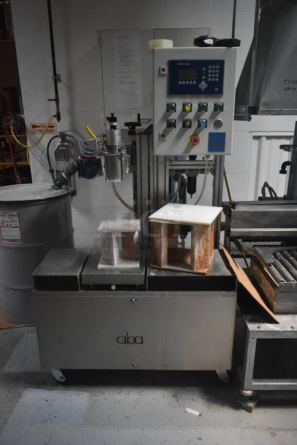 2016 Aba TFGESF-S1-X Gray Metal Commercial Floor Style Semiautomatic Net Weight Filling Machine on Commercial Casters. BUYER MUST REMOVE. - Image 1 of 9