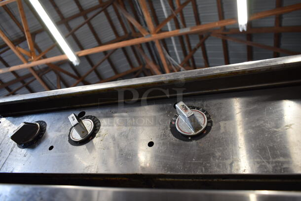 APW Wyott Stainless Steel Commercial Countertop Natural Gas Powered Flat Top Griddle.  - Image 7 of 7