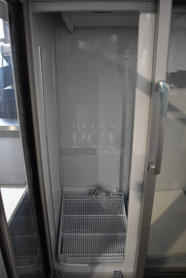 BRAND NEW! Premium Levella Model PRN165DX Metal Commercial 2 Door Reach In Cooler Merchandiser w/ Poly Coated Racks. 115 Volts, 1 Phase. 35x23x73. Tested and Working! - Image 4 of 7