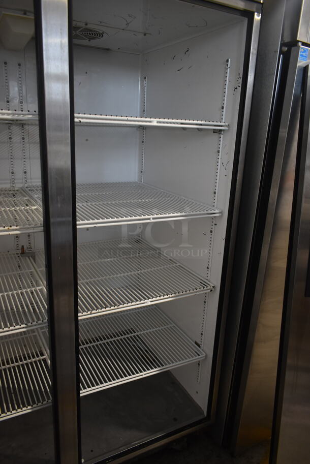 2012 True TG2R-2S ENERGY STAR Stainless Steel Commercial 2 Door Reach In Cooler w/ Poly Coated Racks on Commercial Casters. Doors Need To Be Reattached. 115 Volts, 1 Phase. Tested and Working! - Image 7 of 8
