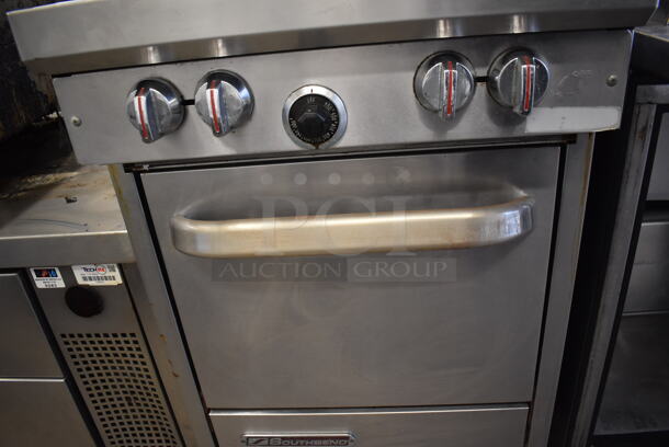 Southbend S24E Stainless Steel Commercial Natural Gas Powered 4 Burner Range w/ Oven and Back Splash on Commercial Casters. 24.5x34x47 - Image 4 of 6