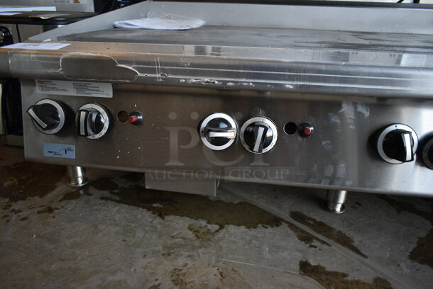 BRAND NEW SCRATCH AND DENT! LATE MODEL! Garland 372GT60GT60N Stainless Steel Commercial Countertop Natural Gas Powered Flat Top Griddle. - Image 4 of 10