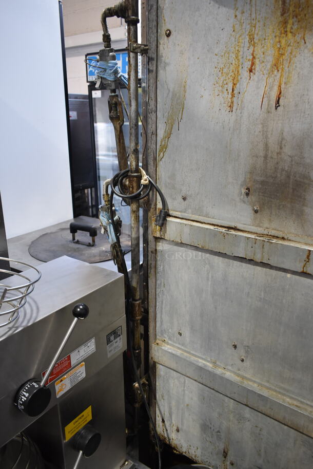 Stainless Steel Commercial Floor Style Natural Gas Powered 7 Spit Rotisserie Oven on Commercial Casters. - Image 6 of 7