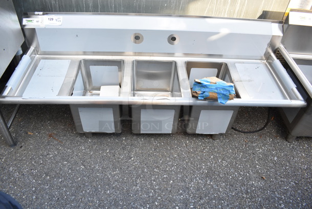 BRAND NEW SCRATCH AND DENT! Regency 600S31014212 58" 16-Gauge Stainless Steel Three Compartment Commercial Sink with Galvanized Steel Legs and 2 Drainboards - 10" x 14" x 10" Bowls - Image 2 of 10