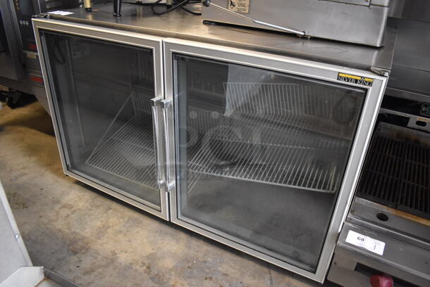 Silver King SKF48G Stainless Steel Commercial 2 Door Undercounter Freezer Merchandiser on Commercial Casters. 115 Volts, 1 Phase. 48x29x31. Tested and Powers On But Does Not Get Cold