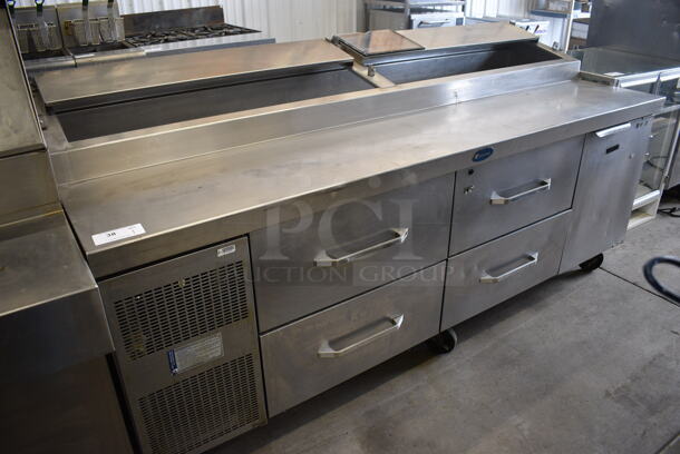 Randell Stainless Steel Commercial Pizza Prep Table w/ 4 Drawers and 1 Door on Commercial Casters. 89x34x44. Tested and Working!