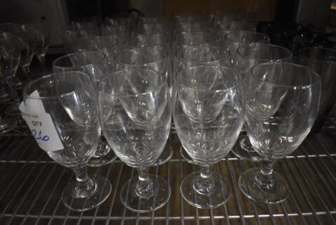 26 Wine Glasses. 3.5x3.5x7. 26 Times Your Bid!