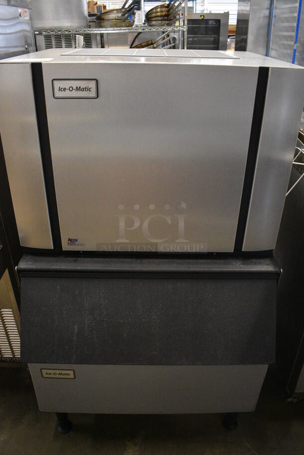 Ice O Matic Model CIM0330FA Stainless Steel Commercial Ice Machine Head on Commercial Ice Bin. 115 Volts, 1 Phase. 31x32x49