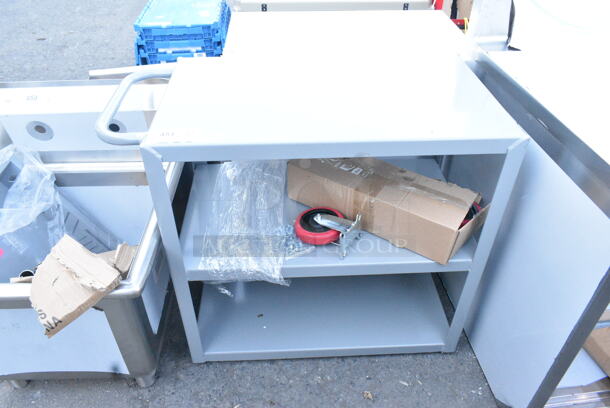 BRAND NEW SCRATCH AND DENT! Lavex Gray Metal 3 Tier Cart w/ Commercial Casters.  - Image 3 of 7