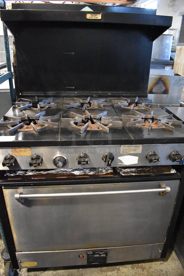 Comstock Castle C330 Metal Commercial Natural Gas Powered 6 Burner Range w/ Oven, Over Shelf and Back Splash. 35x32x59.5 - Image 1 of 9