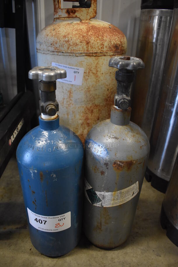 2 Metal Carbon Dioxide Tanks. 5x5x17.5. 2 Times Your Bid! Buyer Must Pick Up - We Will Not Ship This Item. 