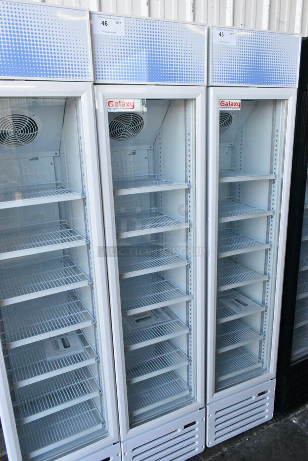 BRAND NEW SCRATCH AND DENT! Galaxy 177GDN5RBW Metal Commercial Single Door Reach In Cooler Merchandiser w/ Poly Coated Racks and Red, White, and Blue LED Lighting. 110-120 Volts, 1 Phase. Tested and Working! - Image 1 of 6