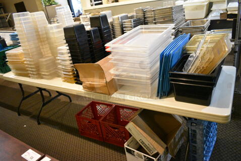 ALL ONE MONEY! Lot of Various Items Including Poly Drop In Bins and Lids. Does Not Include Table. (main dining room)