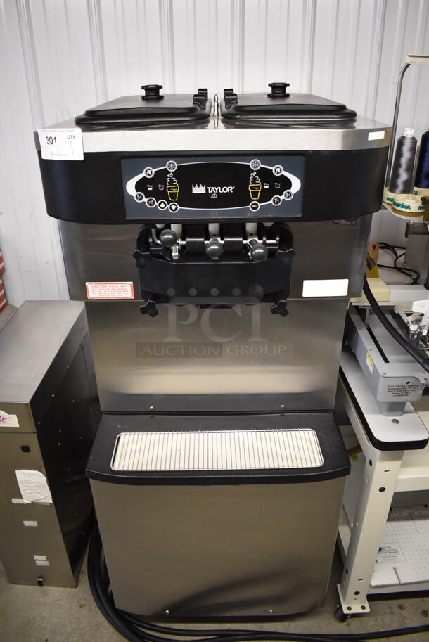 Taylor C713-27 Stainless Steel Commercial Floor Style Water Cooled 2 Flavor w/ Twist Soft Serve Ice Cream Machine on Commercial Casters. 208-230 Volts, 1 Phase. 25x40x60 - Image 1 of 7
