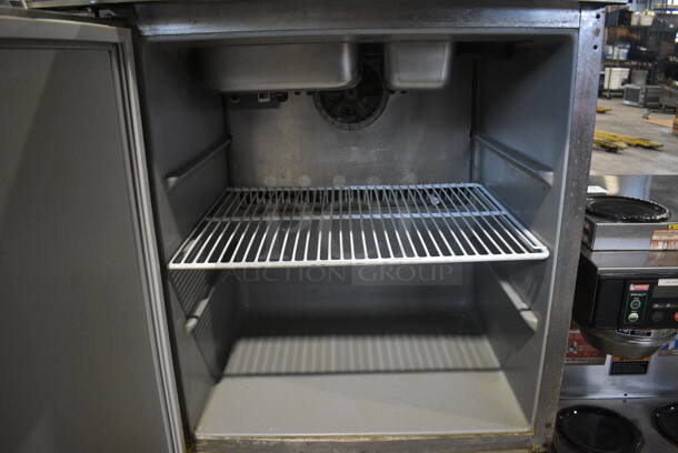 Stainless Steel Commercial Sandwich Salad Prep Table Bain Marie Mega Top w/ Various Drop In Bins and Cutting Board. 27.5x32x43. Tested and Powers On But Temps at 52 Degrees - Image 6 of 6