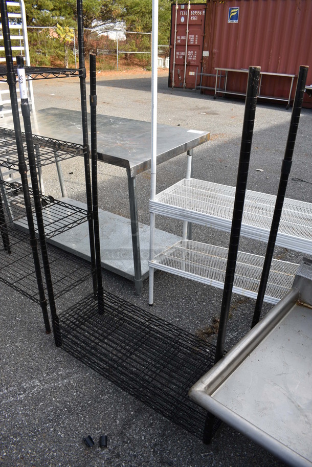 Black Finish 4 Tier Wire Shelving Unit. BUYER MUST DISMANTLE. PCI CANNOT DISMANTLE FOR SHIPPING. PLEASE CONSIDER FREIGHT CHARGES. 35.5x14x54 - Image 1 of 3