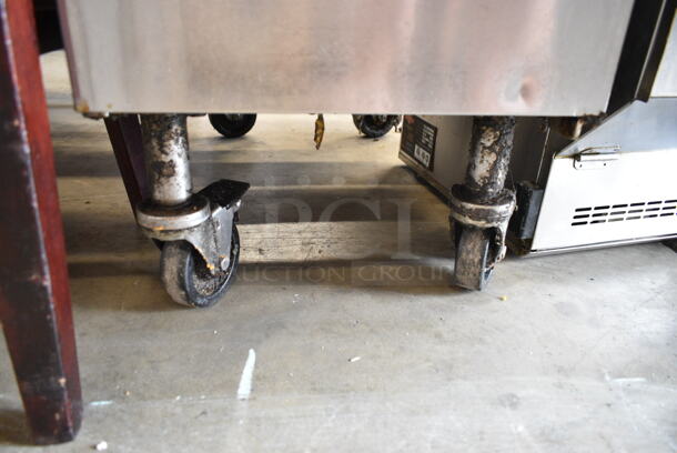 2015 Pitco Frialator SG14 Stainless Steel Commercial Floor Style Natural Gas Powered Deep Fat Fryer on Commercial Casters. 110,000 BTU.  - Image 2 of 8