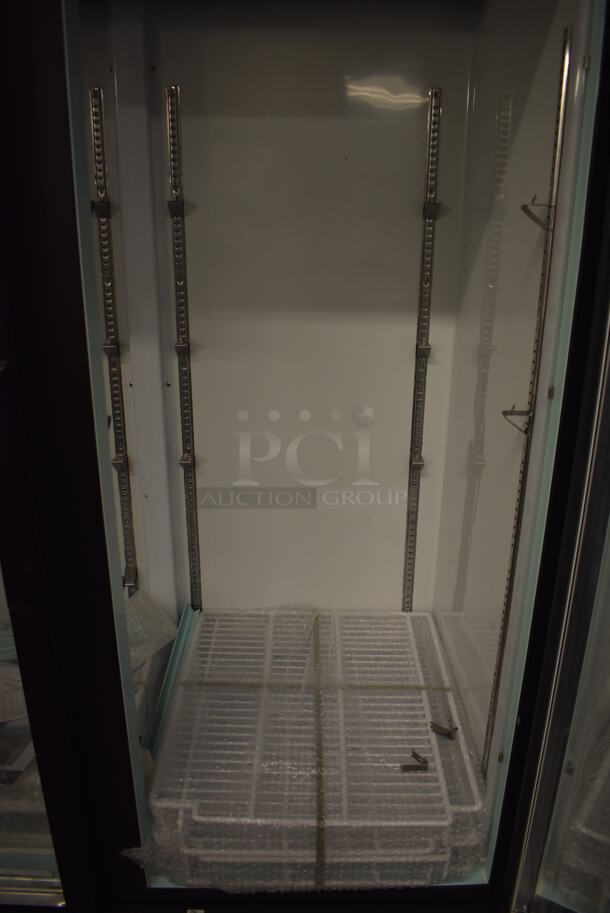 BRAND NEW SCRATCH AND DENT! Avantco 178GDC40HCB Metal Commercial 2 Door Reach In Cooler Merchandiser w/ Poly Coated Racks on Commercial Casters. 115 Volts, 1 Phase. 48x29x85. Tested and Working! - Image 5 of 5