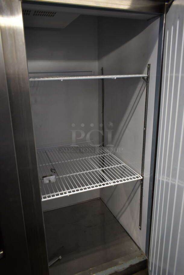 Arctic Air AF49 Stainless Steel Commercial Double Door Reach In Freezer w/ Poly Coated Racks on Commercial Casters. 115 Volts, 1 Phase. Tested and Working! - Image 7 of 7